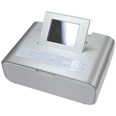 

Canon (Canon) Фотопринтер SELPHY CP1200 (золото) прост в эксплуатации, легко печатается