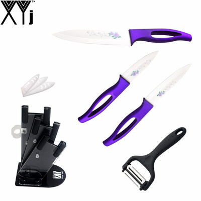 

XYJ Brand Ceramic Knife Set 3" 4" 5" Purple Handle Kitchen Knives + One Black Knife Block + A Multi-Purpose Peeler Pretty Gift