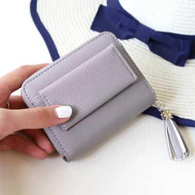 

2017 new lady short wallet female RFID anti-theft anti-theft change purse Korean buckle tassel wallet small wallet