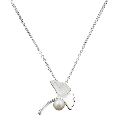 

Luo Linglong s925 sterling silver earrings female ginkgo leaves natural pearl earrings decorated allergy simple temperament art