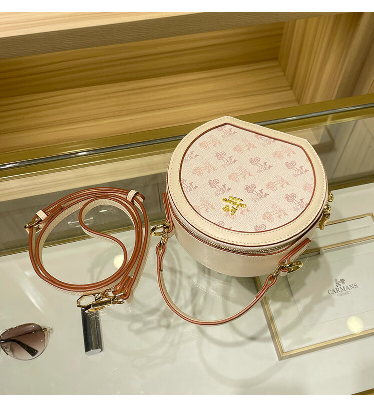 香港mk品牌代购圆饼包单肩斜挎超迁手提小圆包22新款时尚小众圆形包包