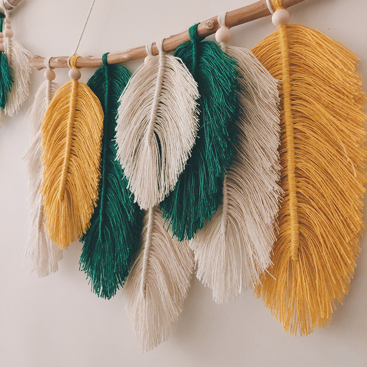 编织羽毛挂毯北欧ins挂毯手工编织串色羽毛叶子摩洛哥民宿房屋背景