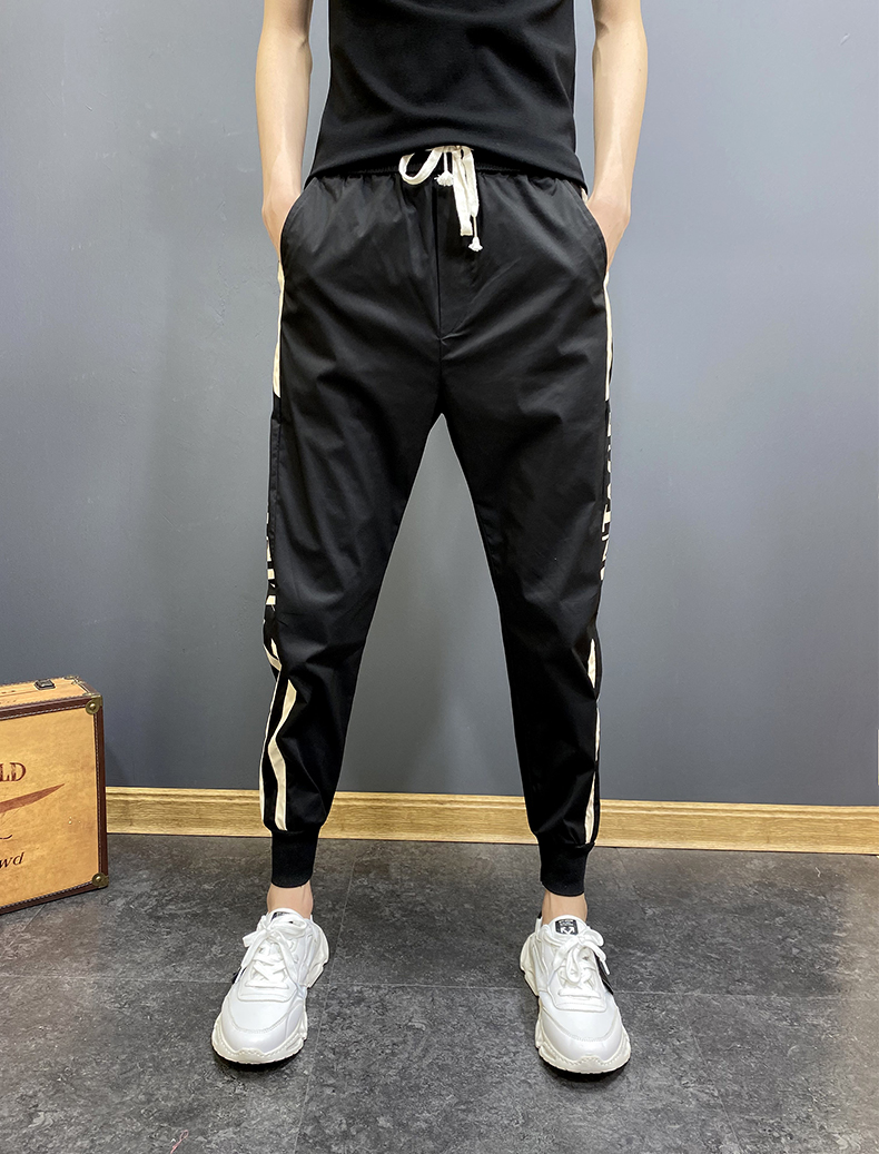 精神小伙裤子夏秋季网红帅气小伙九分哈伦束脚裤修身双杠大码休闲