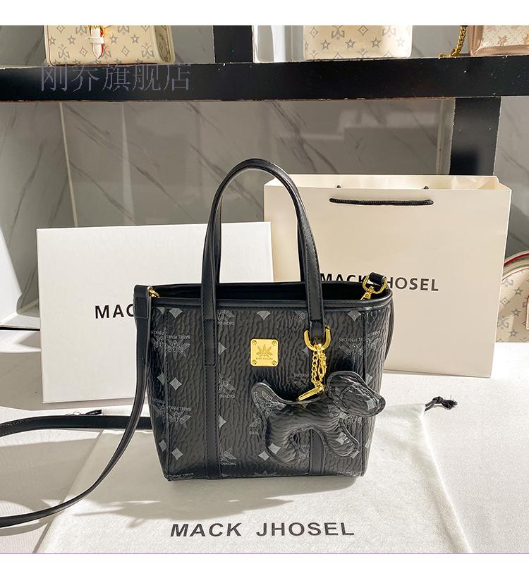 香港mackjhosel真皮粉色水桶包菜篮子手提包包女2021新款潮斜挎包收藏