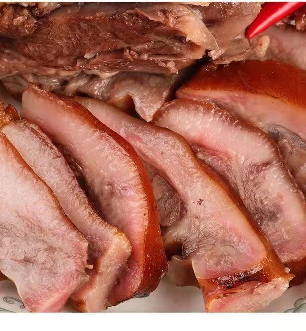 一斤猪头肉秘制五香卤味猪肉熟食真空包装批发酱香猪脸猪肉五香猪头肉