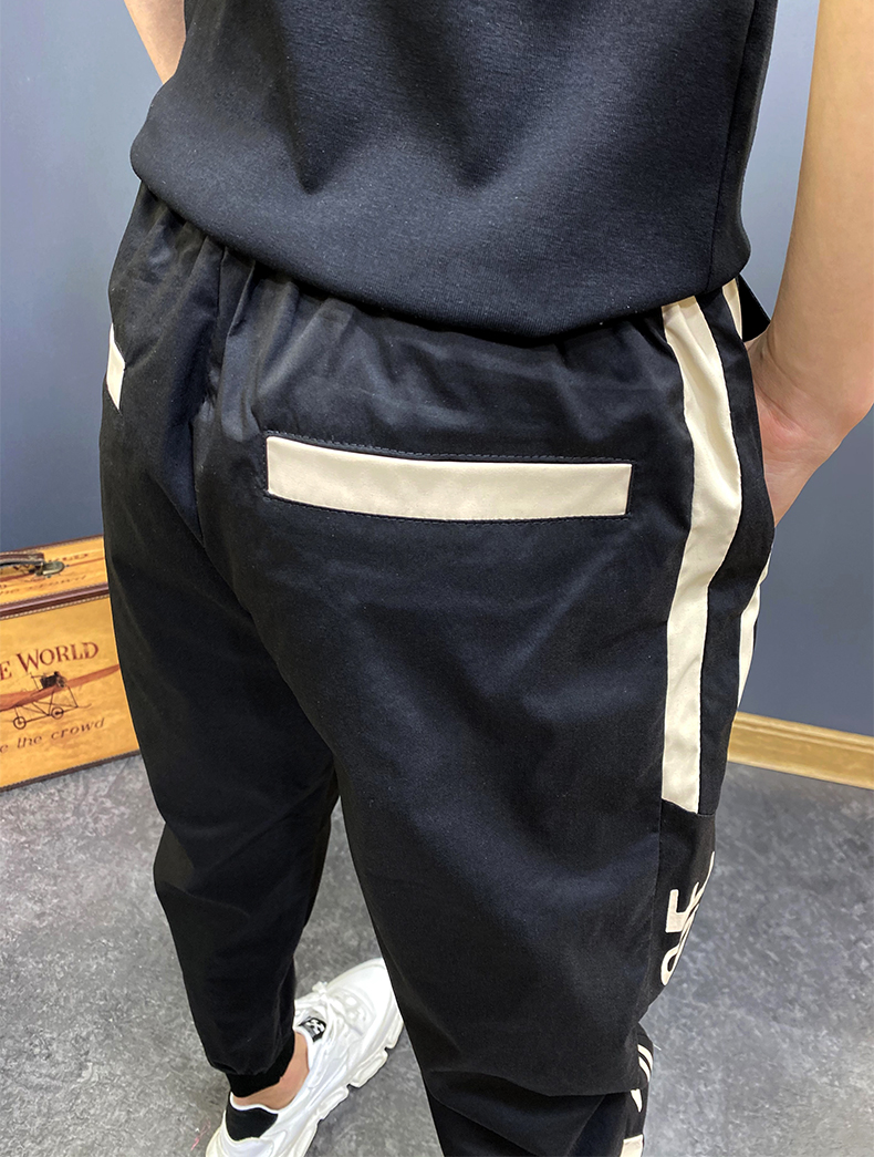 精神小伙裤子夏秋季网红帅气小伙九分哈伦束脚裤修身双杠大码休闲