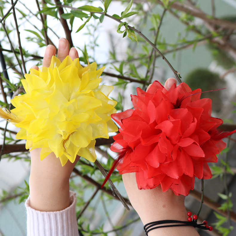 六一手花幼儿园儿童手腕花舞蹈表演道具广场舞手指花头花腕花装饰桔色
