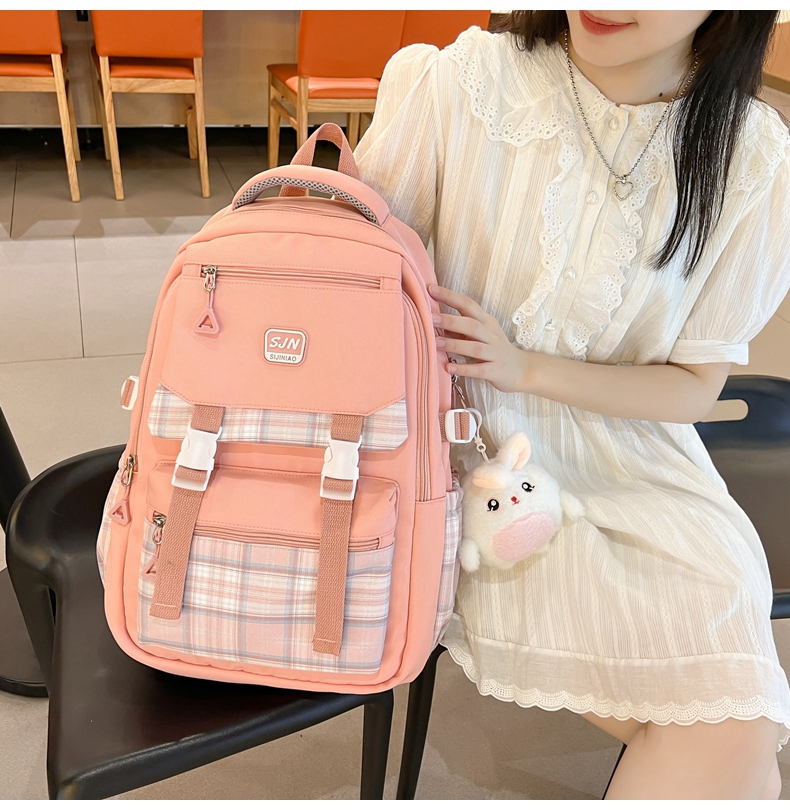 减负护脊书包女初中生耐脏女生小学生三到六年级中学生双肩包少女