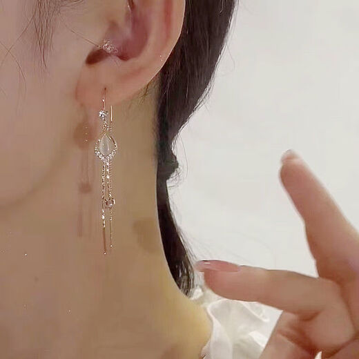 Nanhui Hengan 2024 new cat's eye stone earrings tassel earrings feminine angel eyes versatile long earrings cat's eye tassel earrings