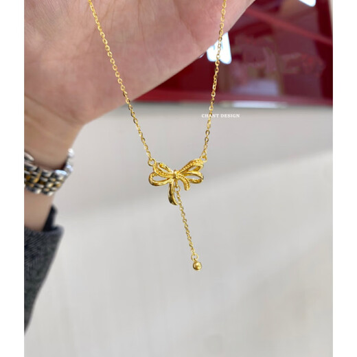 Fat Donglai's same style 18k gold butterfly necklace with K gold knot tassels. Female fugitive princess gold and silver ribbon clavicle chain. New product 18K gold butterfly knot hollow tassel necklace.