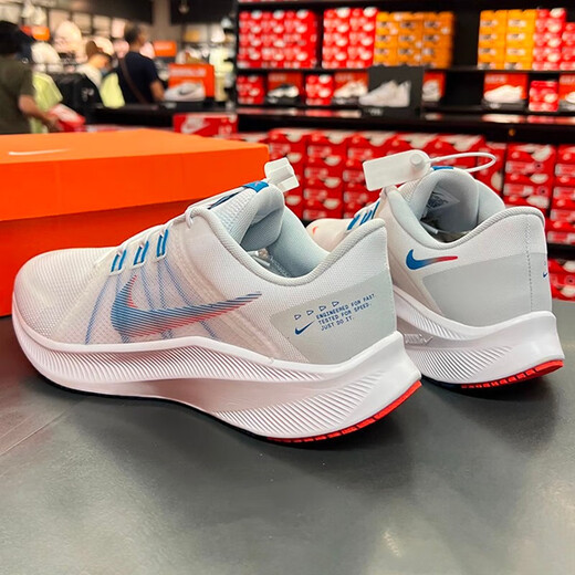 Nike Running Shoes 2025 Été Nouveau entraînement de fitness Mesh SHORTPTABLABLE ABSORBLABLE ABSOLIR LEIL SAUTURES DA1105-101 / Quest 4 / Blanc Blue 40.5
