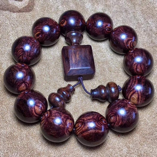 Bracelet Huanghuali aux yeux fantômes du même style de Fat Donglai 2.0 Bracelet Hainan pour hommes avec visage fantôme, motif peau de tigre, yeux fantômes, jaune mer 20 m, jaune mer 15 mm, 15 vieux matériaux pleins de cicatrices