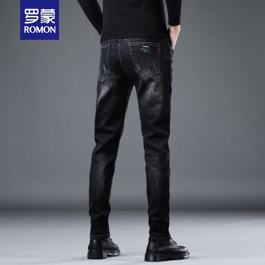 Romon Autumn Jeans negros de alta gama Pantalones delgados de las patas delgadas de los hombres que susurra versátil elástico de moda