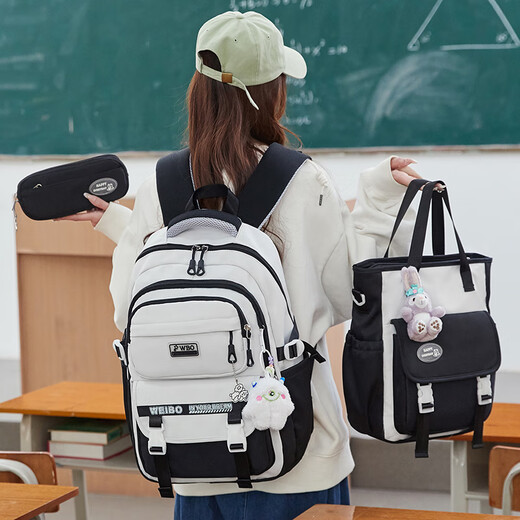 
Youth is the best time to reduce burden and protect the spine schoolbag for women with super large capacity junior high school schoolbag for five and sixth grade schoolbag for primary school students with high appearance 9905 black three-piece set