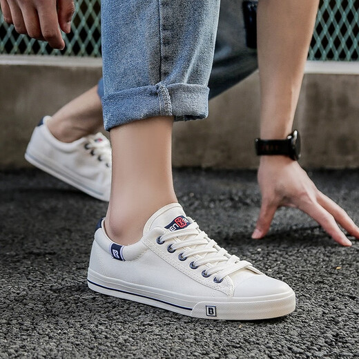 Chaussures en toile de printemps et d'automne d'origine humaine pour hommes et femmes couples basses à semelles plates, chaussures de tableau décontractées pour hommes et étudiants, les chaussures pour hommes polyvalentes sont à la mode et respirante. Blanc légèrement plus petit. 42 style masculin