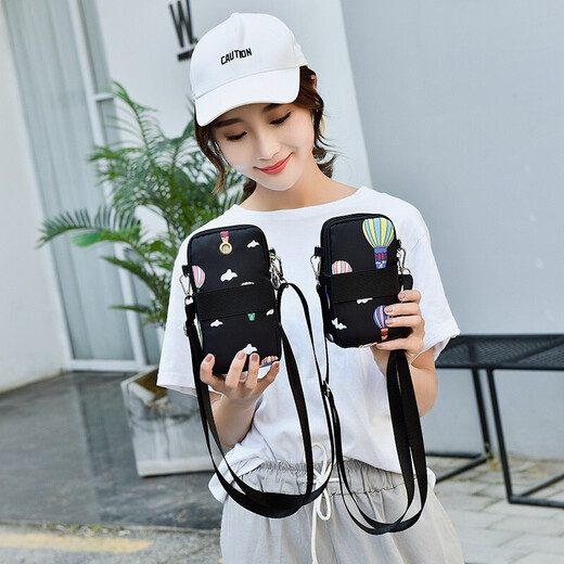 Tuzun (kingtrip) small fresh mini bag running sleeve arm bag mobile phone bag women's crossbody bag Korean style halter neck mobile phone bag portable hand-held wrist coin purse Navy blue balloon (small size)