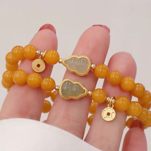 Goldsmith Lee's natural beeswax bracelet is transformed into yellow honey and Hetian jade gourd bracelet, which is an ancient style gift for best friends. Yellow honey and Hetian jade fortune bracelet 8mm
