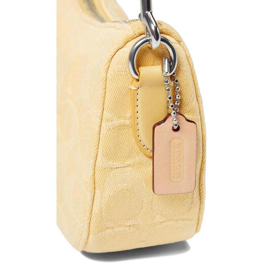 蔻驰（COACH） 女式手拿包 Signature Swinger 潮流百搭轻奢横款手提小包 Pale Yellow