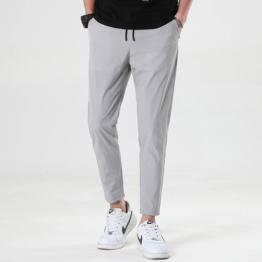 Dumeizi Pantalones casuales para hombres en verano Lace-up suelto delgado y versátil delgado y delgado Slim pies pequeños Harun nueve puntos Negro de moda