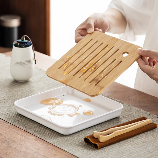 Gold inlaid jade travel tea set home outdoor portable mutton fat jade porcelain Kung Fu tea set tea tray beautiful view of the sea of clouds