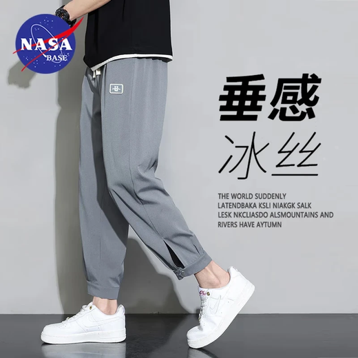 Pantalones informales de moda de moda oficial de la NASA Base para hombres y mujeres Summer delgados holgazanes holgados Pantalones de nueve puntos Pantalones elásticos de seda para hombres K311 Khaki L (peso recomendado 115-130 Jin [Jin iguala 0.5 kg])