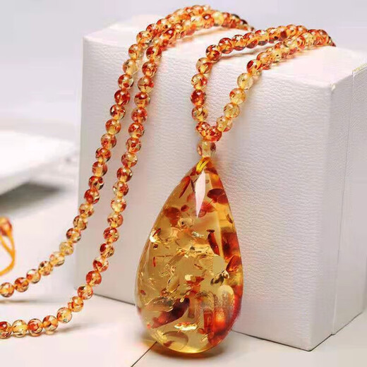 Chishetian. Natural flower amber water drop pendant sweater chain beeswax amber raw stone rainbow chain necklace men and women Russian flower amber