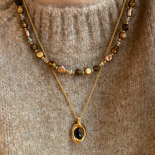 YIZUN. CHOMEL Maillard wear tiger eye stone beaded necklace women's autumn and winter 2024 new light luxury niche versatile sweater chain suit