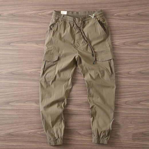 Commander Xiong Frühlings- und Herbstarbeitshose Männer leichte Outdoor Trendy Outdoor modische Hose Elastische Gürtel Trendy Hosen Männer schwarz #15696 Taschen können 3xl 145-160jin [Jin gleich 0,5 kg] abgeschnitten werden]