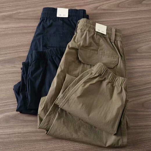 Commander Xiong Frühlings- und Herbstarbeitshose Männer leichte Outdoor Trendy Outdoor modische Hose Elastische Gürtel Trendy Hosen Männer schwarz #15696 Taschen können 3xl 145-160jin [Jin gleich 0,5 kg] abgeschnitten werden]