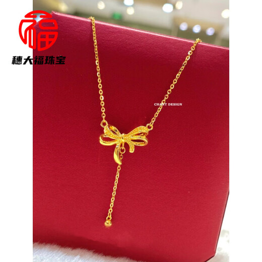 Fat Donglai's same style 18k gold butterfly necklace with K gold knot tassels. Female fugitive princess gold and silver ribbon clavicle chain. New product 18K gold butterfly knot hollow tassel necklace.