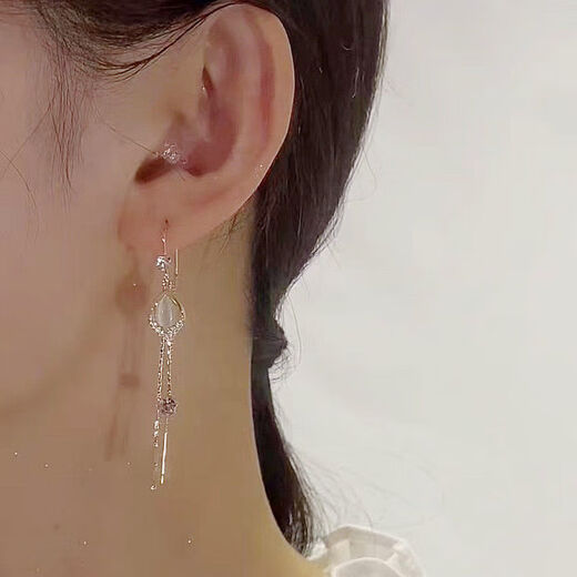 Nanhui Hengan 2024 new cat's eye stone earrings tassel earrings feminine angel eyes versatile long earrings cat's eye tassel earrings