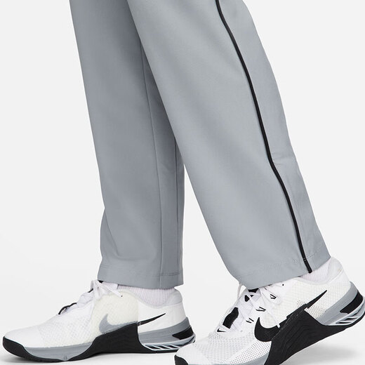 Nike (Nike) Pantalones de secado rápido de gris primavera Pantalones tejidos tejidos de hombres rectos Pantalones sueltos de pantalones casuales transpirables negros/DM6627-010 Drying rápido transpirable M 120-130Jin [Jin equivale a 0.5 kg]