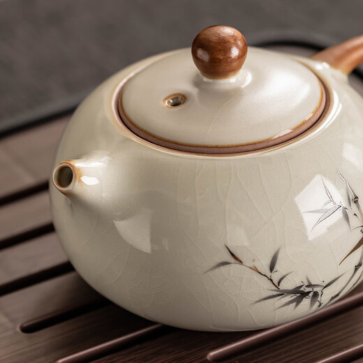 Porcelain brand tea set, one pot and four cups, household light luxury Kung Fu teapot, tea cup with tea tray, small set for making tea for guests, Huang Ru Yu Huang Liang 4 cups + walnut color small square plate