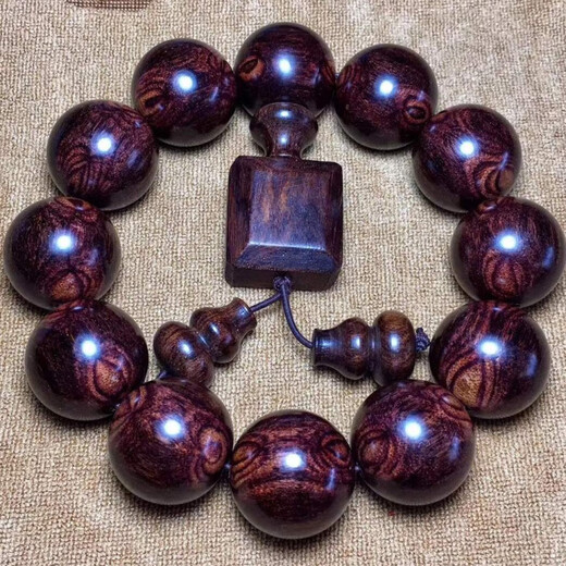 Bracelet Huanghuali aux yeux fantômes du même style de Fat Donglai 2.0 Bracelet Hainan pour hommes avec visage fantôme, motif peau de tigre, yeux fantômes, jaune mer 20 m, jaune mer 15 mm, 15 vieux matériaux pleins de cicatrices