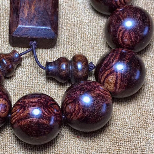 Bracelet Huanghuali aux yeux fantômes du même style de Fat Donglai 2.0 Bracelet Hainan pour hommes avec visage fantôme, motif peau de tigre, yeux fantômes, jaune mer 20 m, jaune mer 15 mm, 15 vieux matériaux pleins de cicatrices