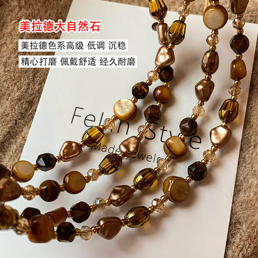 YIZUN. CHOMEL Maillard wear tiger eye stone beaded necklace women's autumn and winter 2024 new light luxury niche versatile sweater chain suit