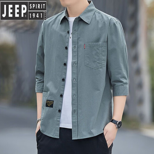 Jeep Spirit haut de gamme en coton pur fermer la chemise d'été pour hommes en vrac lâche de 7 quart de coton de travail à manches mi-manche et polyvalent de haute qualité de haute qualité de haute qualité.