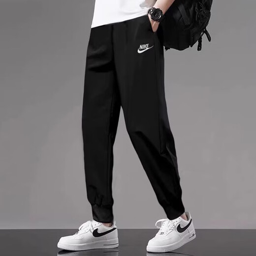 耐克（NIKE）运动裤男裤2025夏季新款休闲束脚健身裤跑步长裤针织篮球宽松卫裤 黑色FQ4331-010束脚收口纯棉 M /170/建议体重120-130斤