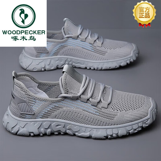 Zapatos para hombres de la marca Woodpecker 2024 Zapatos de malla voladora de nuevo estilo de primavera y verano para zapatillas para hombres livianas, cómodas cómodas y transpirables XZT9195 Modelo de cuatro estaciones gris 39 Tamaño de cuero estándar