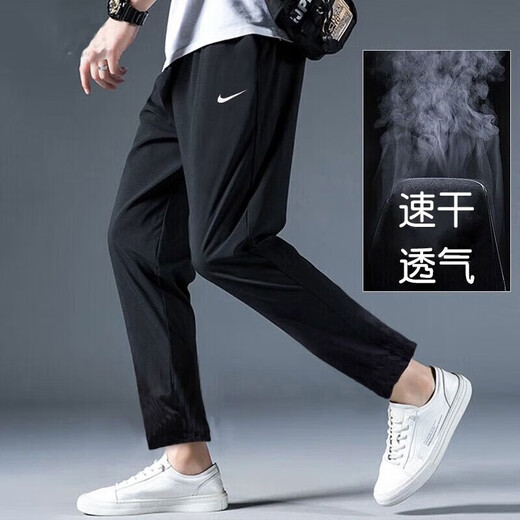 Nike (Nike) pantalones para hombres Summer Nuevos pantalones deportivos al aire libre Pantalones casuales de hombres transpirables delgados pantalones sueltos Pantalones rectos DM6627-010 Secado rápido de secado L
