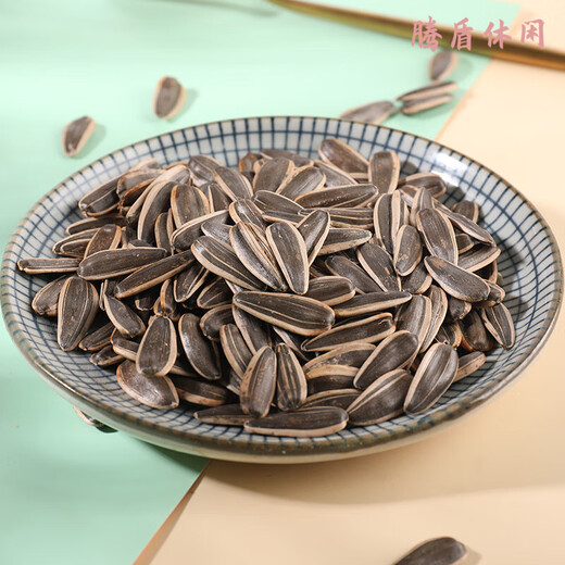 Specialty Youlian Shenlong melon seeds and sunflower seeds roasted nuts 500g bag red date flavor 1 Jin Jin equals 0.5 kg