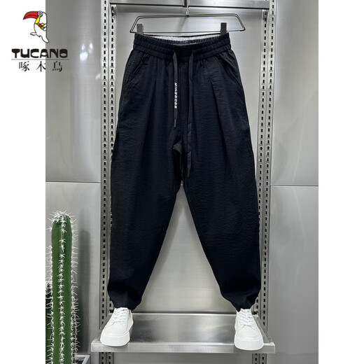 啄木鸟（TUCANO）2024夏季新款棉麻透气垂感休闲裤男士潮流宽松褶皱哈伦萝卜裤 黑色 4XL 建议190-210斤