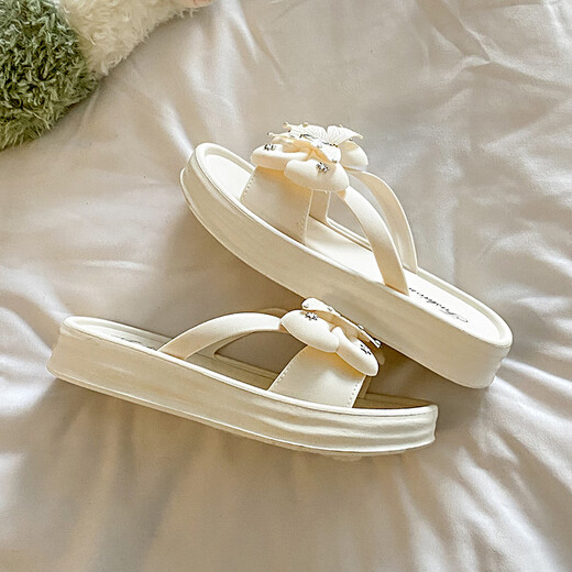 Yuebanqing (YUEBANQING) small fragrance style bow thick-soled sandals for women 2025 summer new style wear anti-slip heightened beach flip flops White-Korean version 38 -3937-38 feet