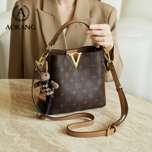 Aokang -Tasche Frauenbag 2025 Neue trendige Eimer Handtasche Leichte Luxus -Cross -Body -Umhängetasche Geburtstagsgeschenk für Freundin und Frau