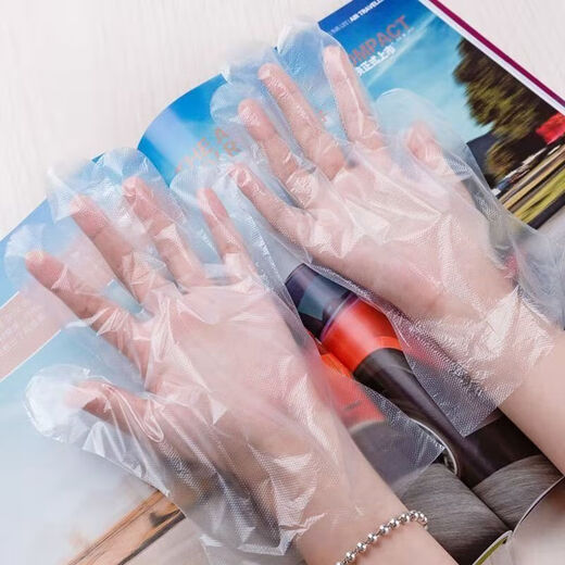Gants jetables cuisine alimentaire épaissis épaissis à usure transparent transparent des gants de PE ménage