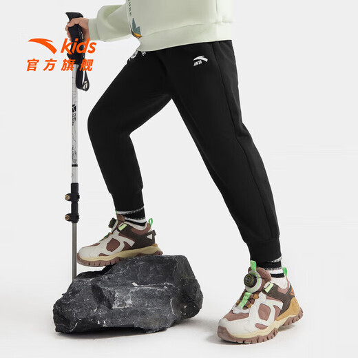 安踏儿童裤子男小童装2025秋季新品综训炫干透气舒适简约针织运动长裤 【加绒保暖】基础黑-1 140