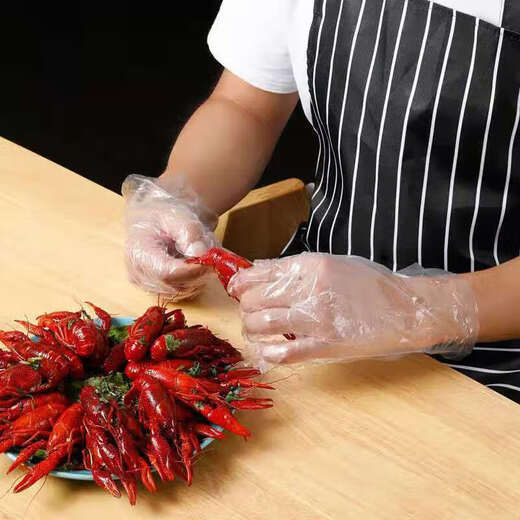 Gants jetables cuisine alimentaire épaissis épaissis à usure transparent transparent des gants de PE ménage
