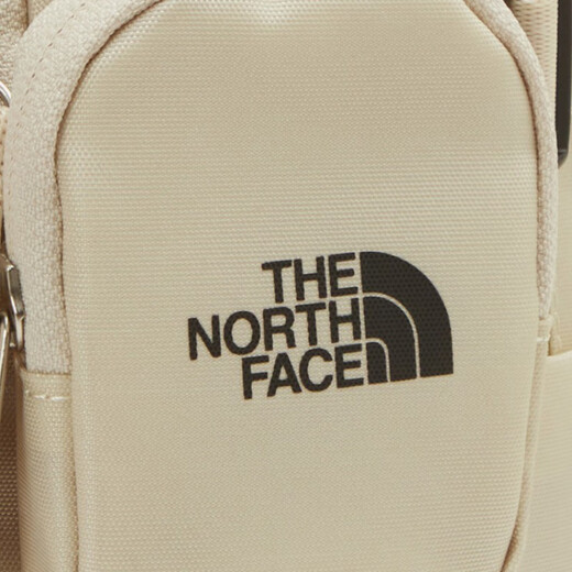 北面（The North Face）运动休闲徽标Logo拉链开合可调节肩带尼龙书包背包双肩包常规男女 米色