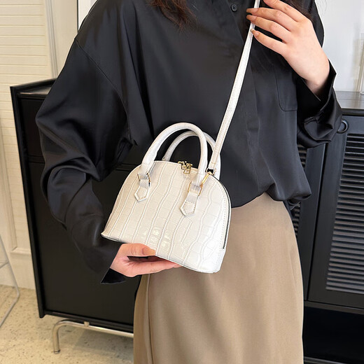 Sac à main en pierre pour les femmes 2025 Nouveau sac de coquille polyvalent rétro de haute qualité sac à bandoulière à une épaule blanc