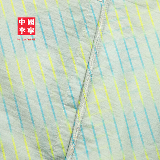 李宁中国李宁 x 塔卡沙联名系列女子25夏季新款反光宽松运动休闲外套 灰蓝绿满印-1 M